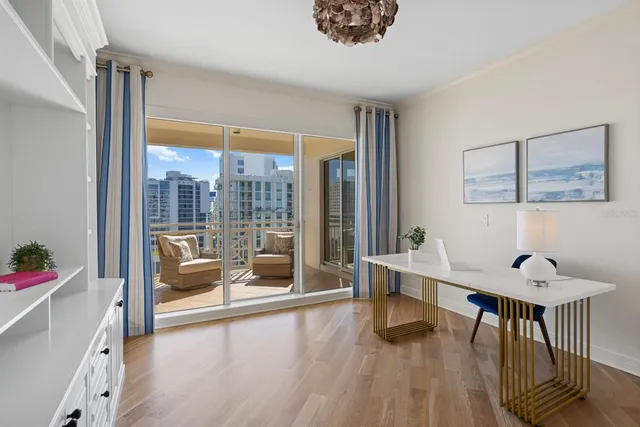 a view of a balcony with furniture