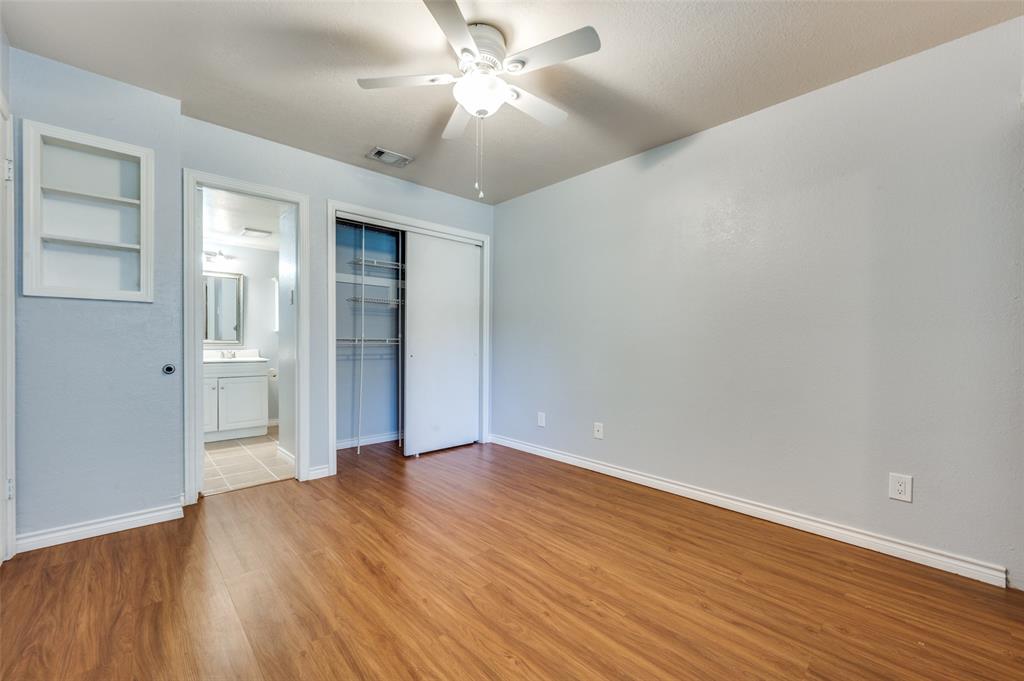 2240 Tarpley Road, Unit 32 Carrollton, TX 75006 - Photo 10 of 15 1st Floor Bedroom with Ensuite Bath