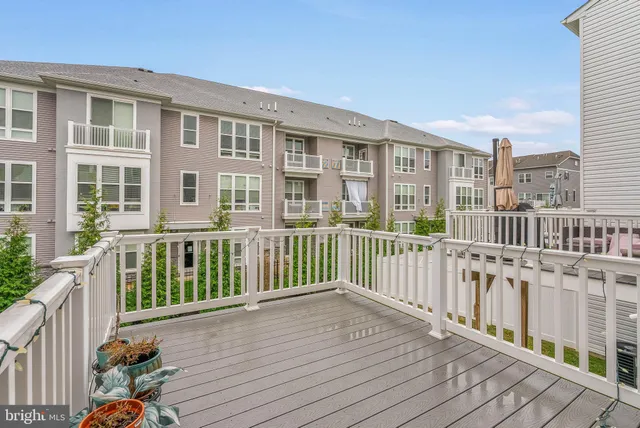 a view of a brick building from a deck