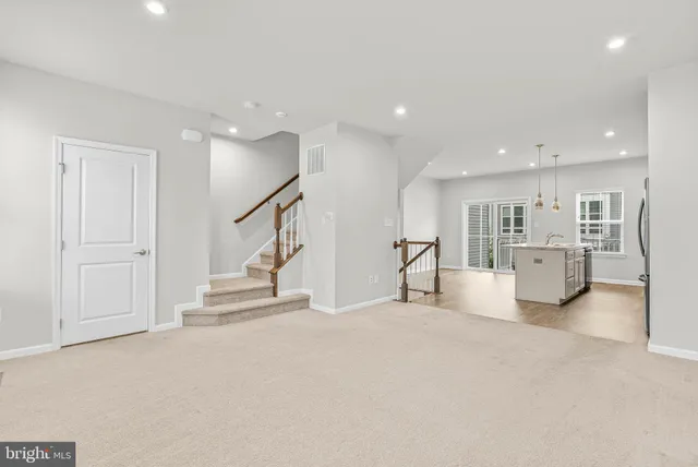 a view of a livingroom with chairs