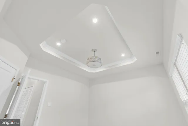 a view of a hallway with windows