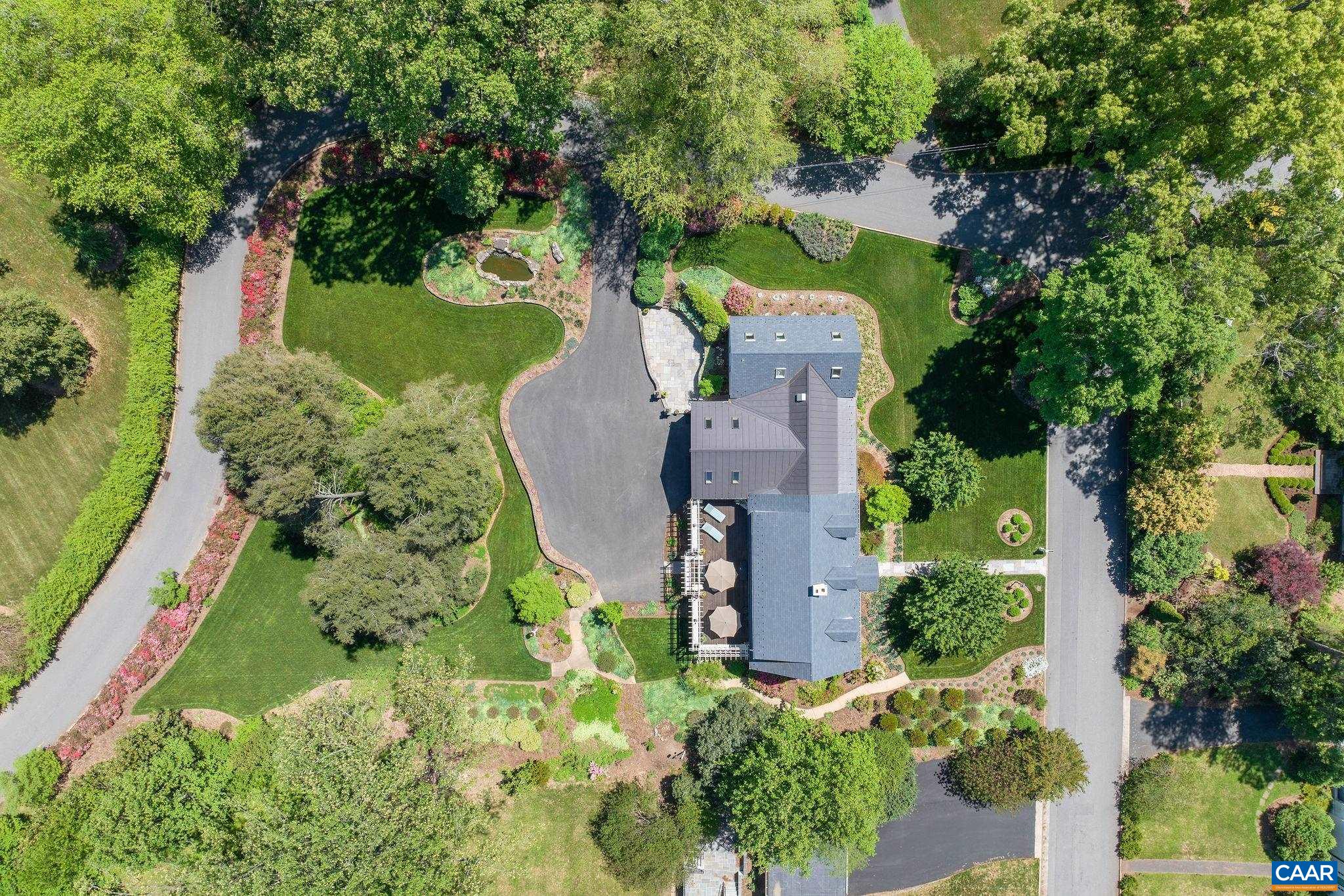 2001 Hessian Road Charlottesville, VA 22903 - Photo 2 of 47 an aerial view of a house with a yard basket ball court and outdoor seating