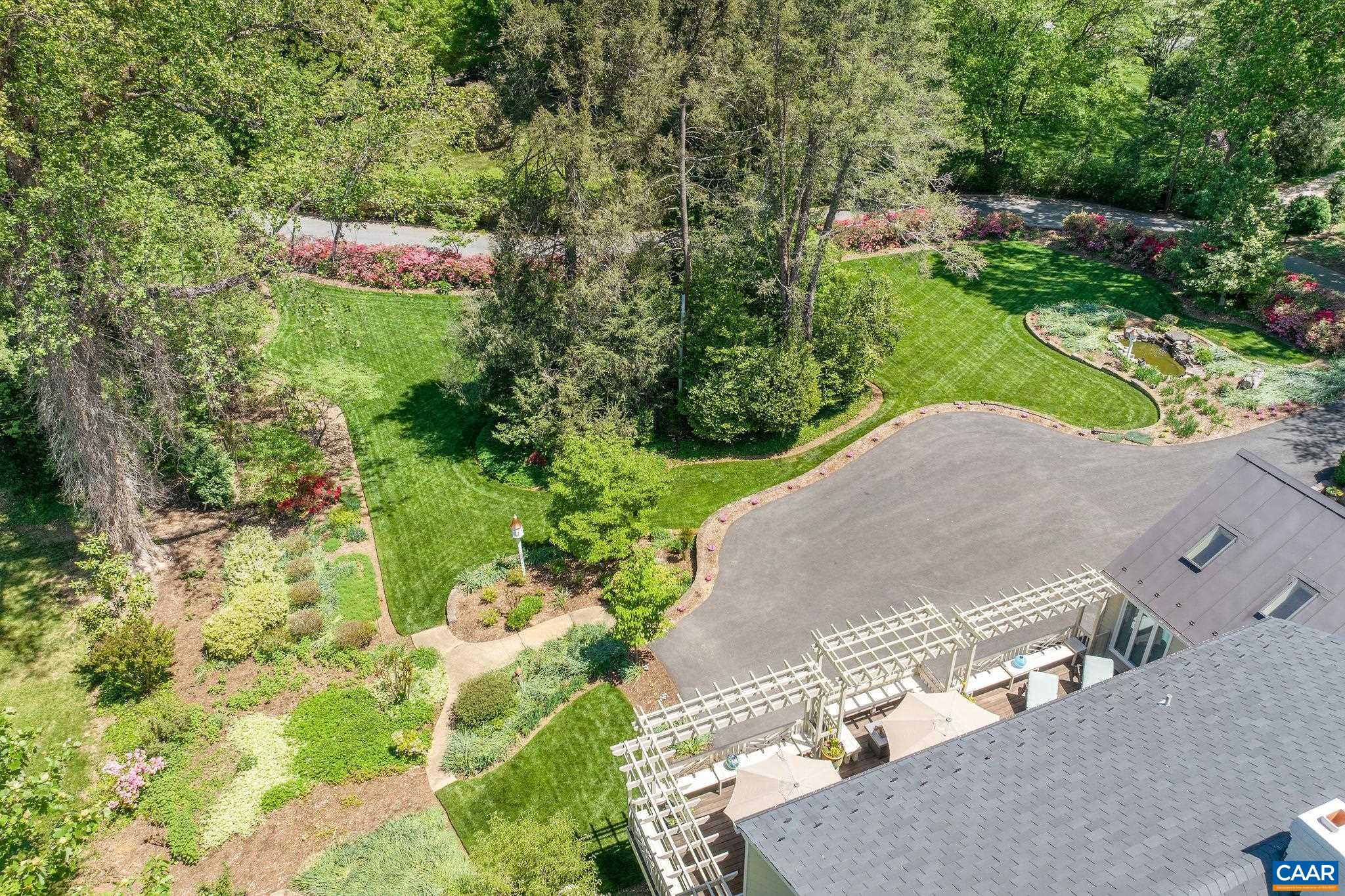 2001 Hessian Road Charlottesville, VA 22903 - Photo 35 of 47 an aerial view of residential house with outdoor space and trees all around