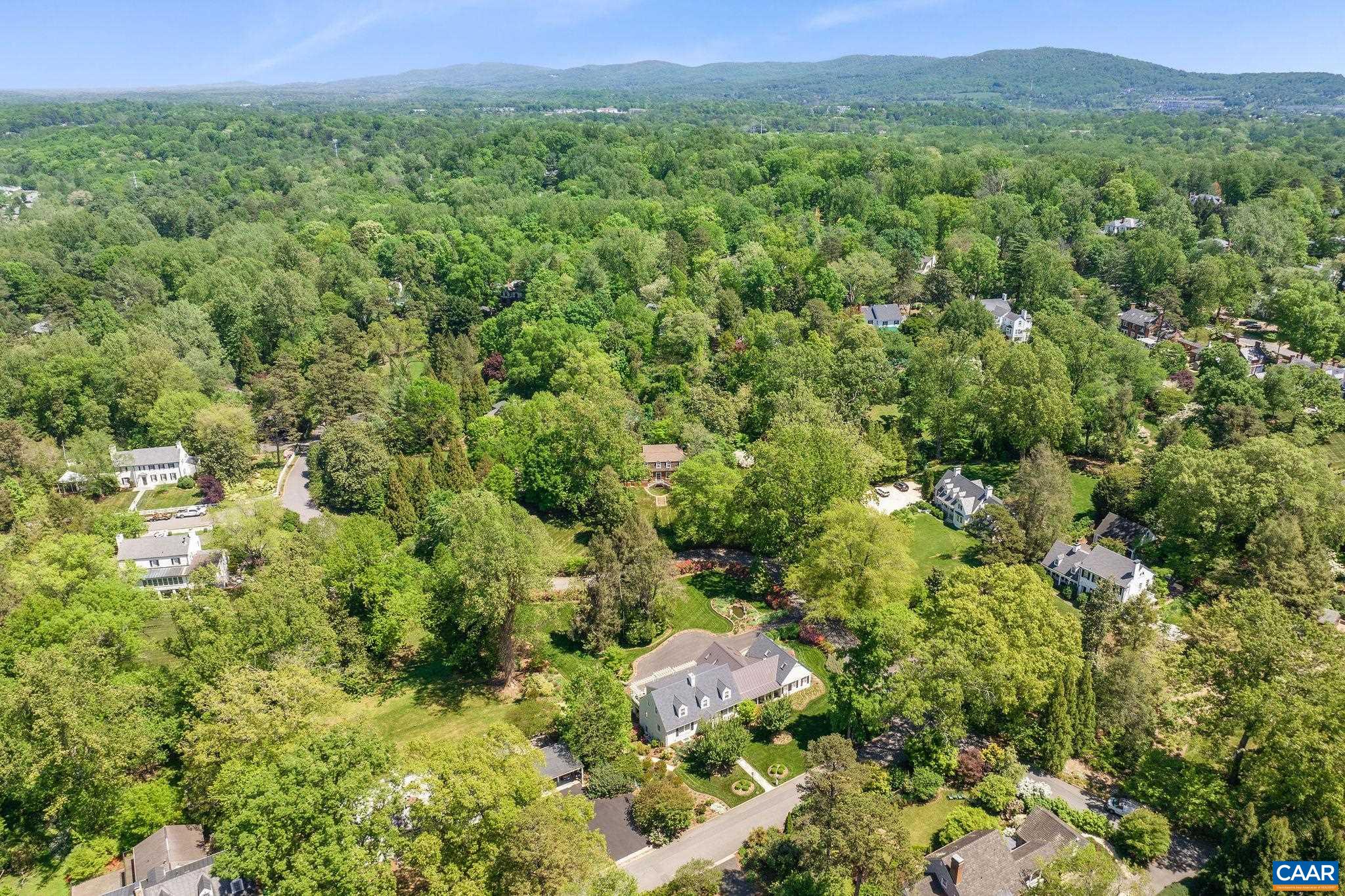 2001 Hessian Road Charlottesville, VA 22903 - Photo 41 of 47 a view of a lush green field with lots of bushes