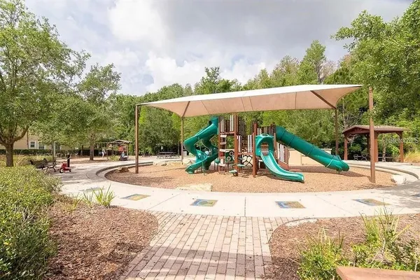 a lobby with furniture and a large window