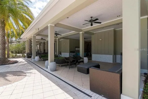 a view of a swimming pool with a yard