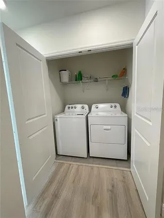 a utility room with dryer and washer
