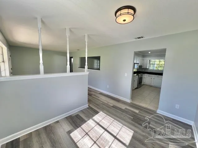 view of an empty room with a window