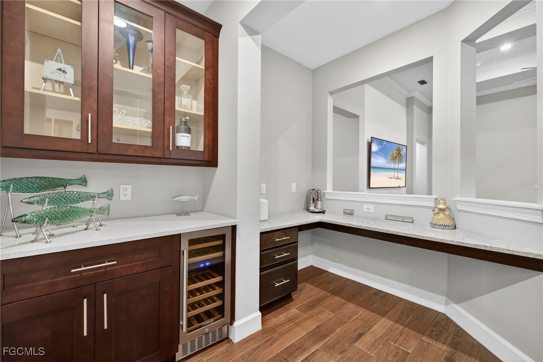 19815 Beverly Park Road Estero, FL 33928 - Photo 13 of 49 a kitchen with a sink and a window
