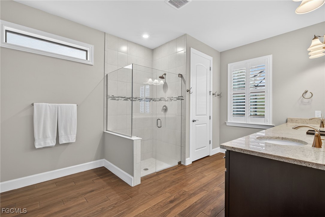 19815 Beverly Park Road Estero, FL 33928 - Photo 20 of 49 a kitchen with a refrigerator and a sink