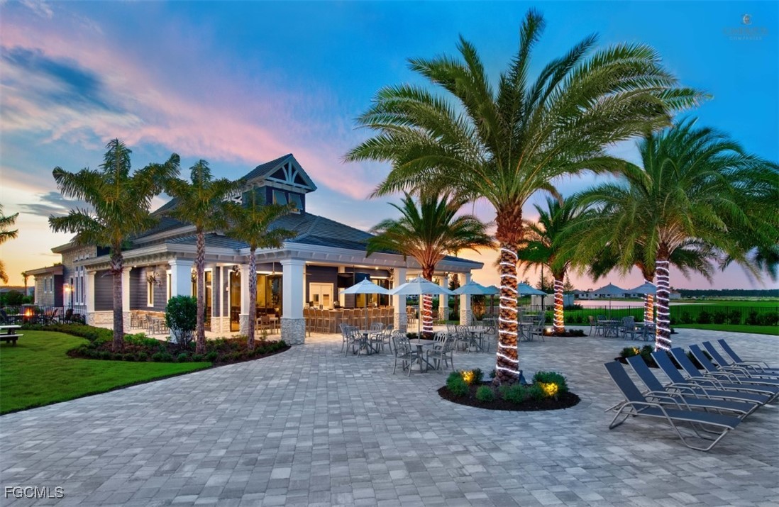 19815 Beverly Park Road Estero, FL 33928 - Photo 45 of 49 a view of a house with outdoor space and sitting area