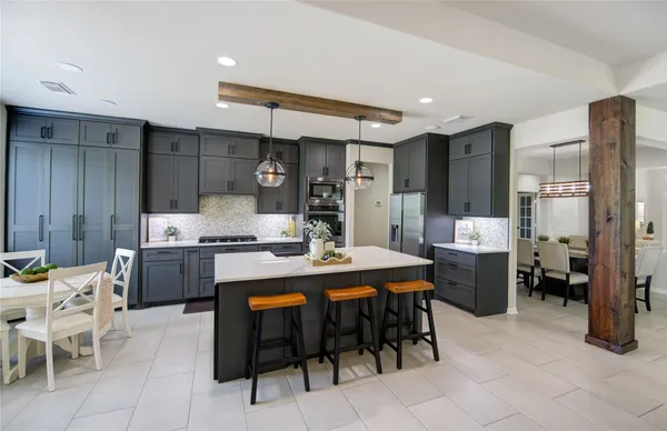 a bathroom with a sink a mirror and a toilet