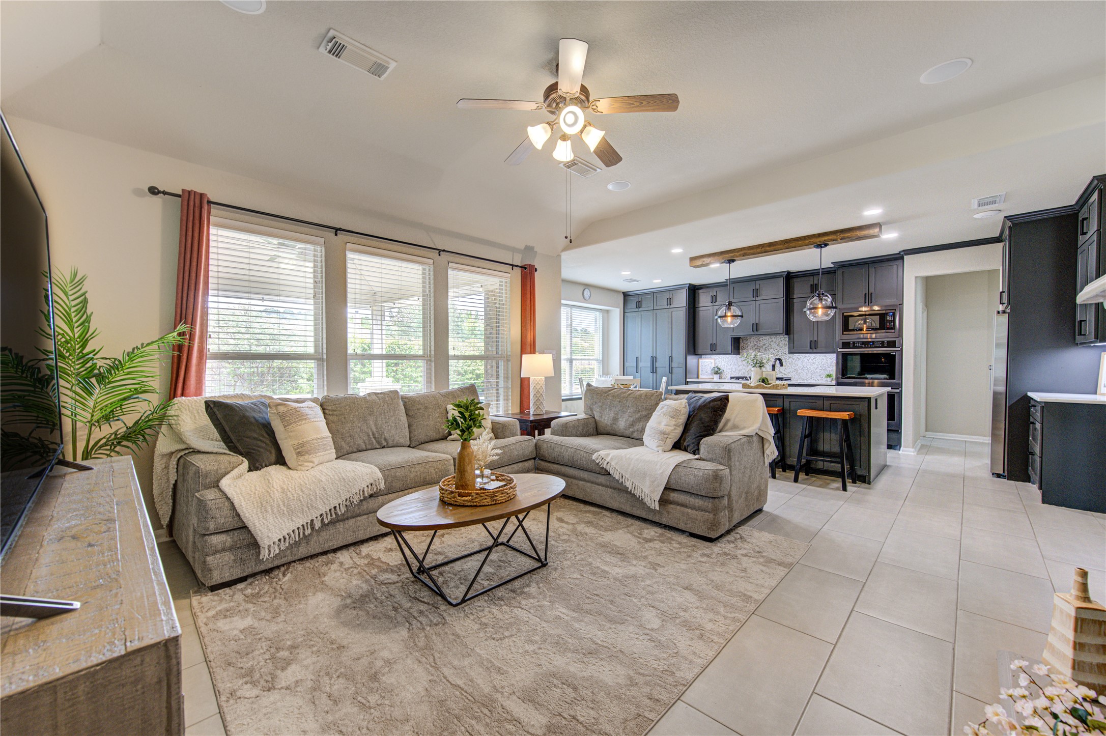 20026 Mellishaw Court Spring, TX 77379 - Photo 19 of 49 a living room with furniture and a large window