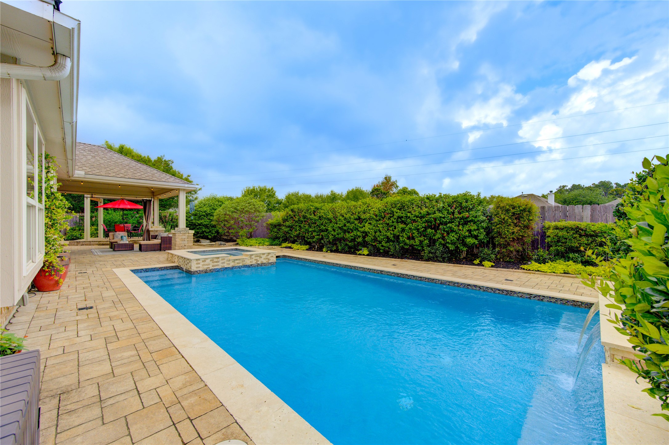 20026 Mellishaw Court Spring, TX 77379 - Photo 41 of 49 a swimming pool with outdoor seating and yard