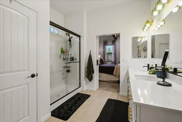 a bedroom with furniture and a window