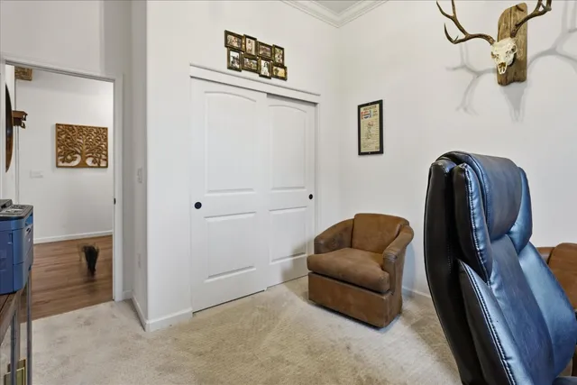 a view of an outside dining space with furniture