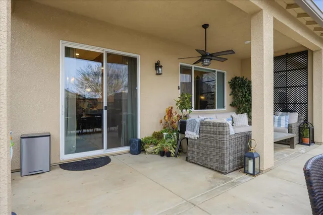 a yellow house with a outdoor space