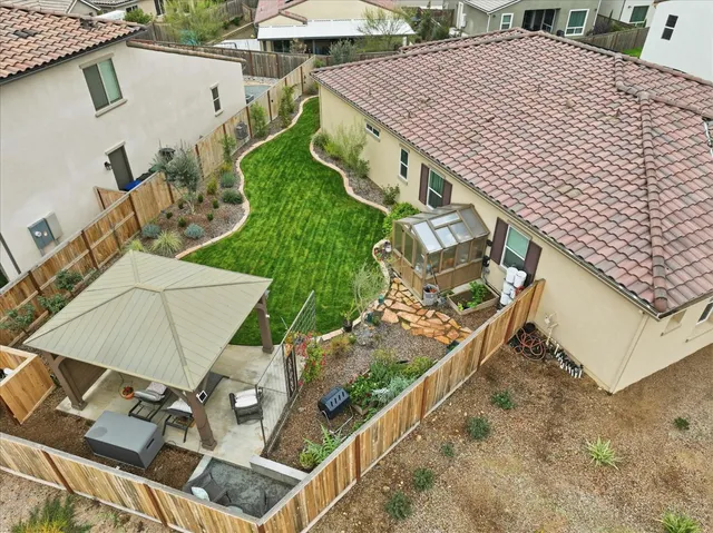 a view of a swimming pool with a patio