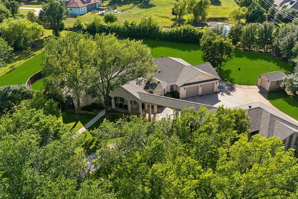 1135 Copper Canyon Road Copper Canyon, TX 76226 - Photo 13 of 40 Single-Story Retreat Tucked Beneath Mature Trees On Two Landscaped Acres