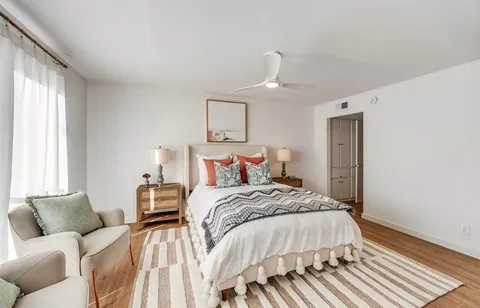 a bed room with a bed and a couch