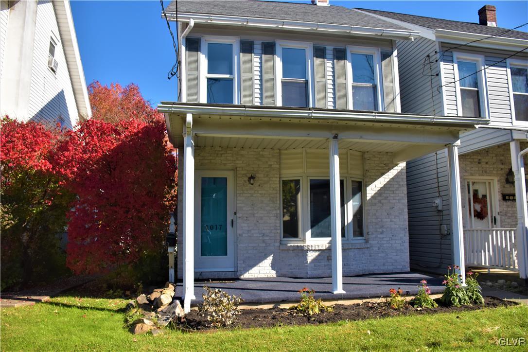 a front view of house with yard
