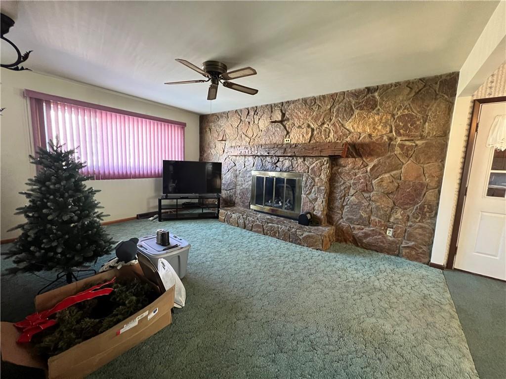 136 Seneca Way New Castle, PA 16102 - Photo 6 of 15 a living room with furniture and a fireplace