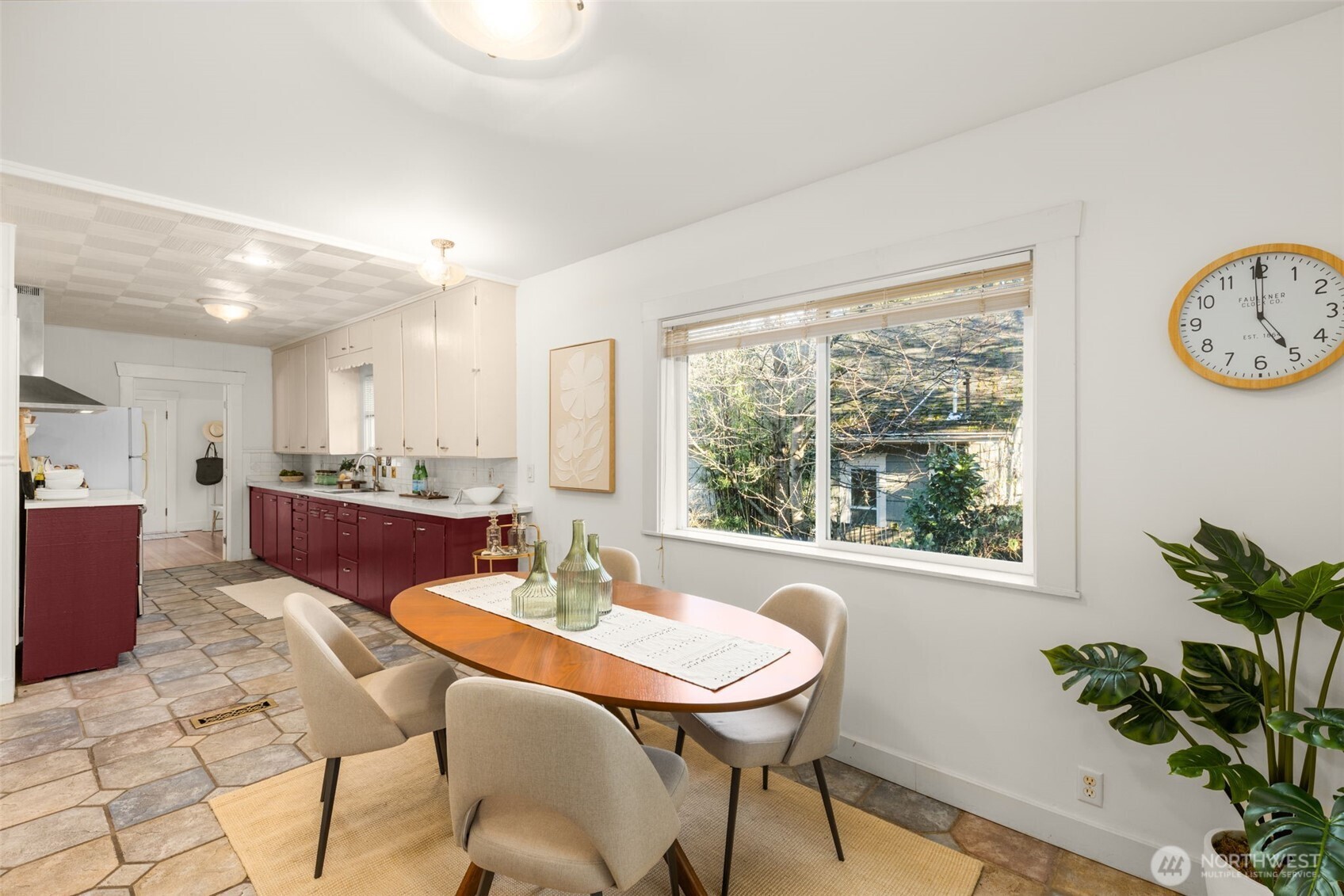 619 Northwest 89th Street Seattle, WA 98117 - Photo 11 of 24 a view of a dining room with furniture window and wooden floor