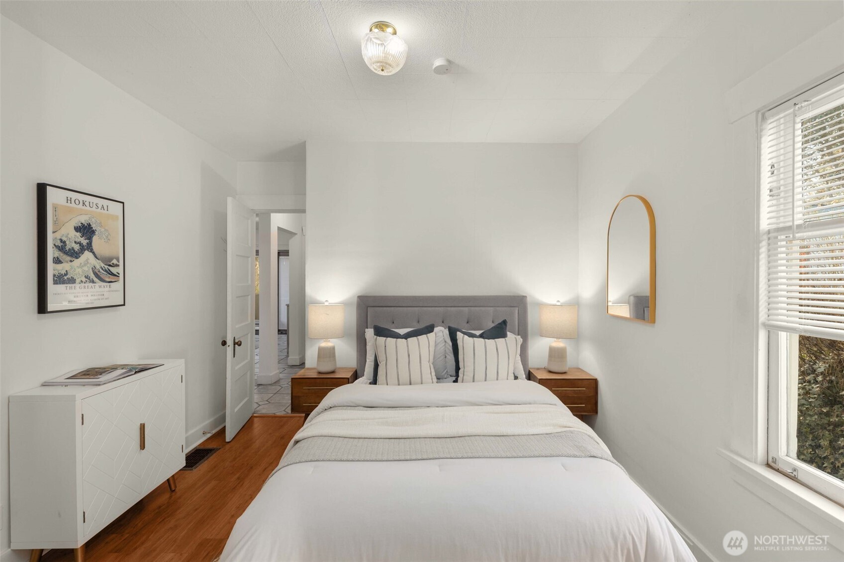 619 Northwest 89th Street Seattle, WA 98117 - Photo 12 of 24 a bedroom with bed and a window
