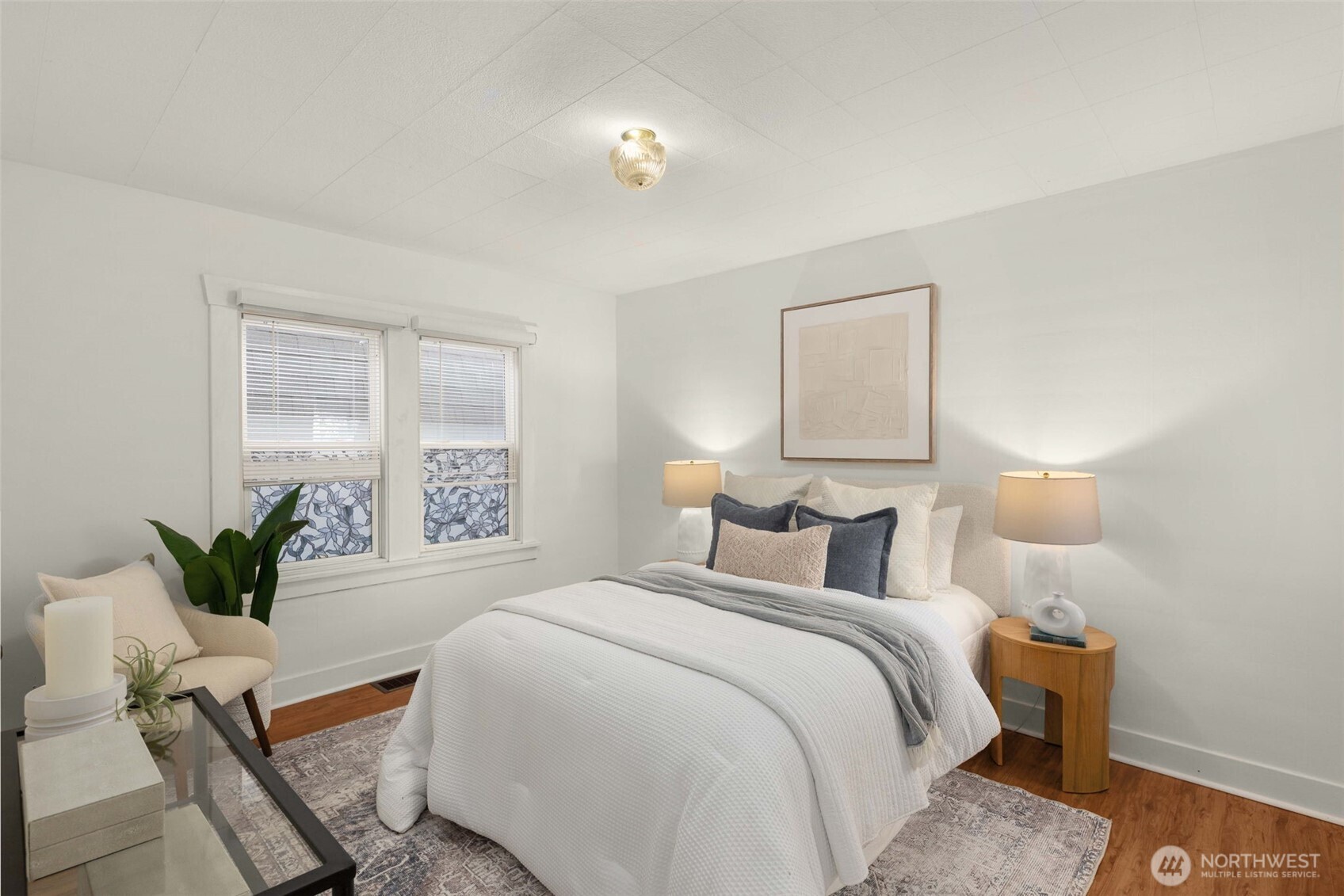 619 Northwest 89th Street Seattle, WA 98117 - Photo 15 of 24 a bedroom with a bed and a window