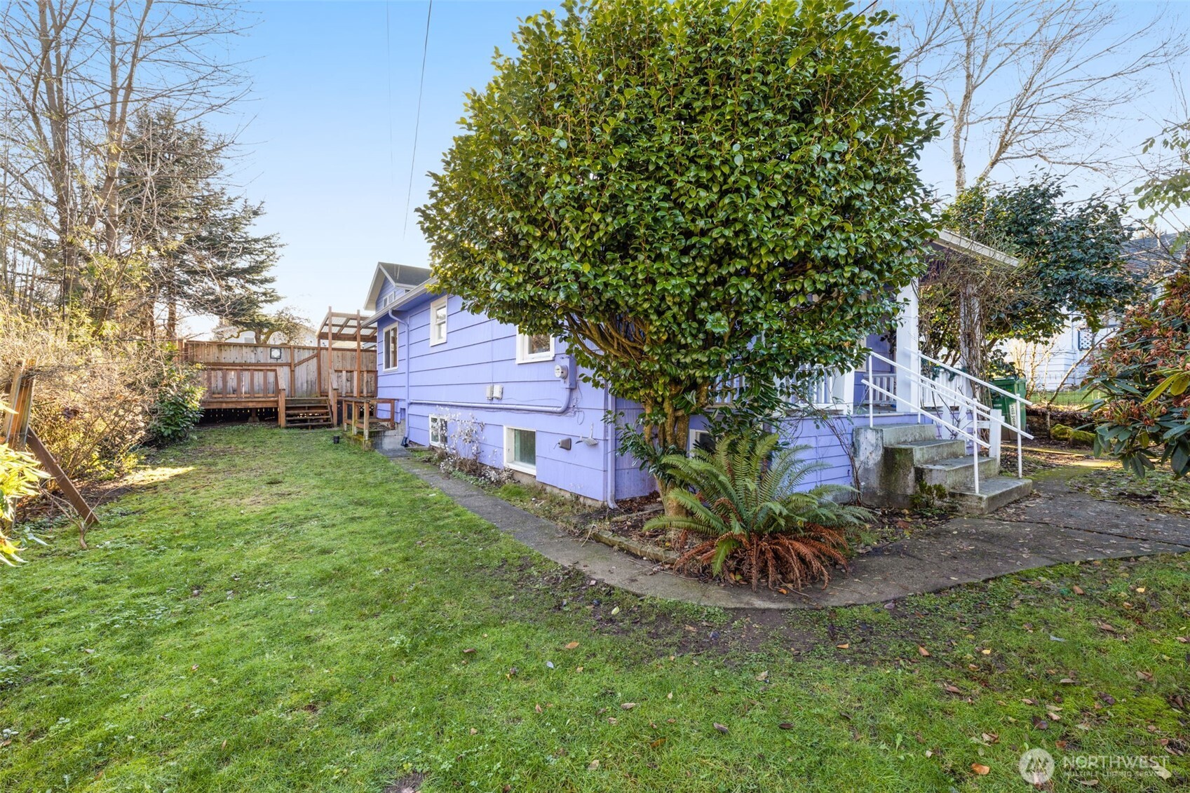 619 Northwest 89th Street Seattle, WA 98117 - Photo 20 of 24 a view of a house with a yard