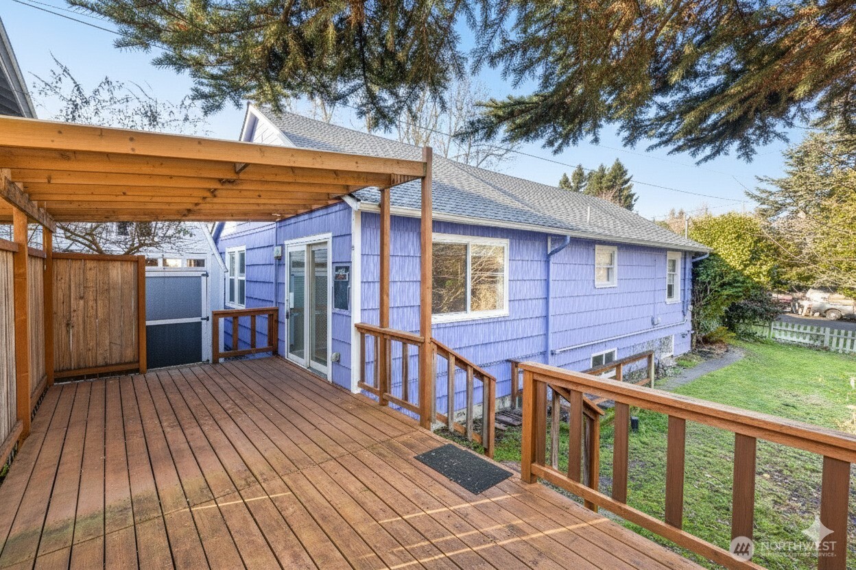 619 Northwest 89th Street Seattle, WA 98117 - Photo 2 of 24 a view of a wooden deck