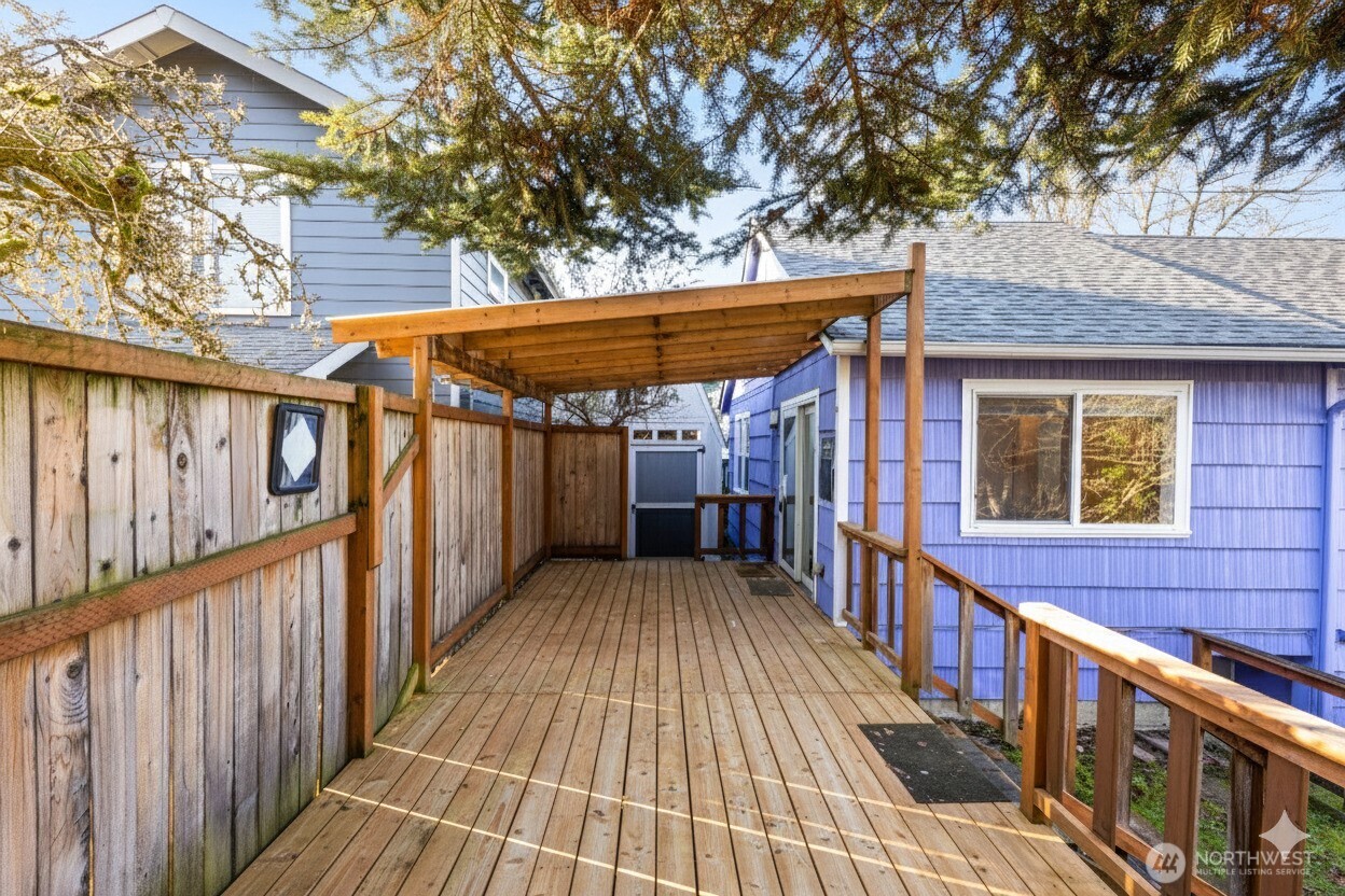 619 Northwest 89th Street Seattle, WA 98117 - Photo 22 of 24 a view of a wooden deck