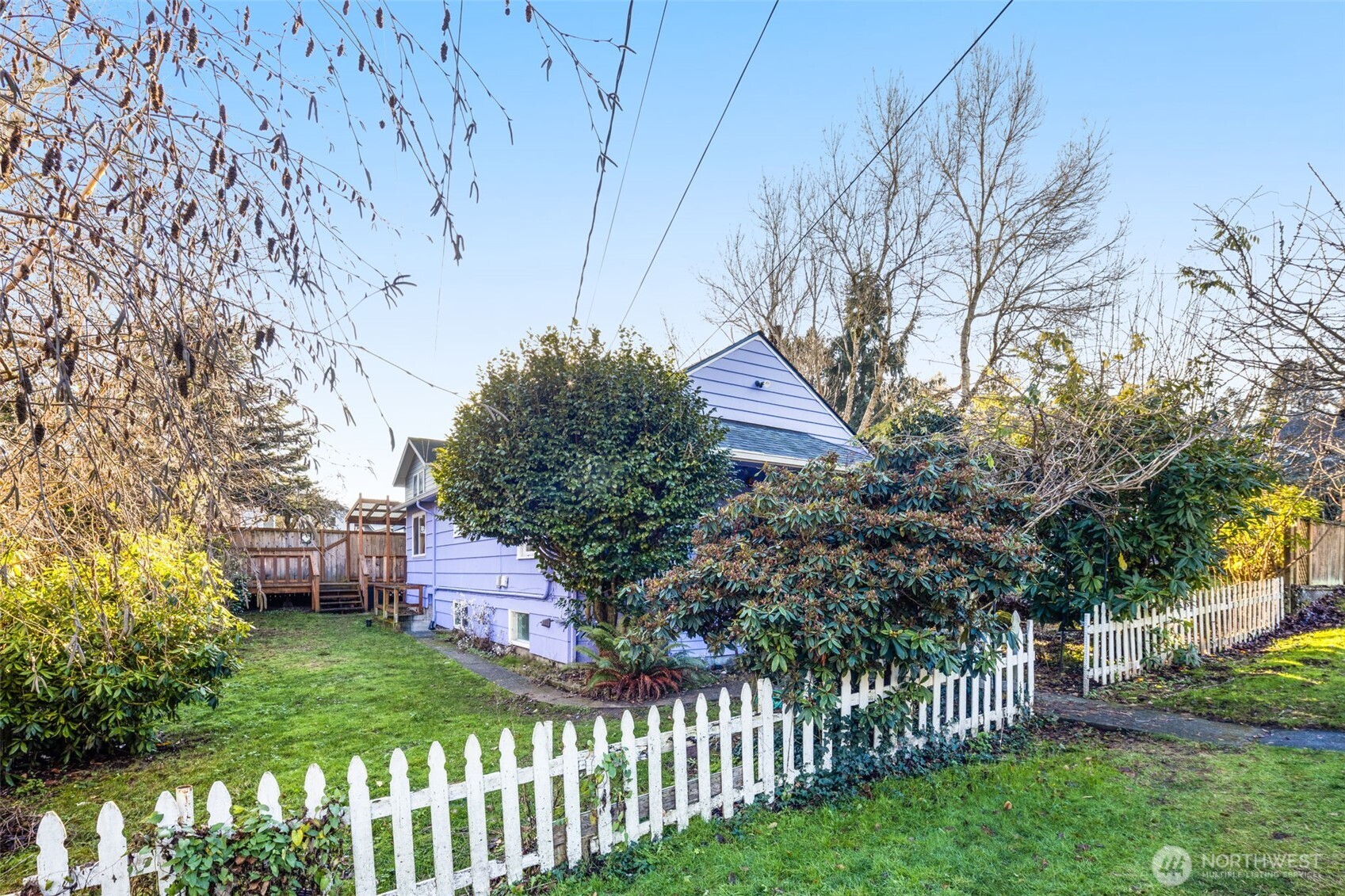 619 Northwest 89th Street Seattle, WA 98117 - Photo 23 of 24 a front view of a house with a garden