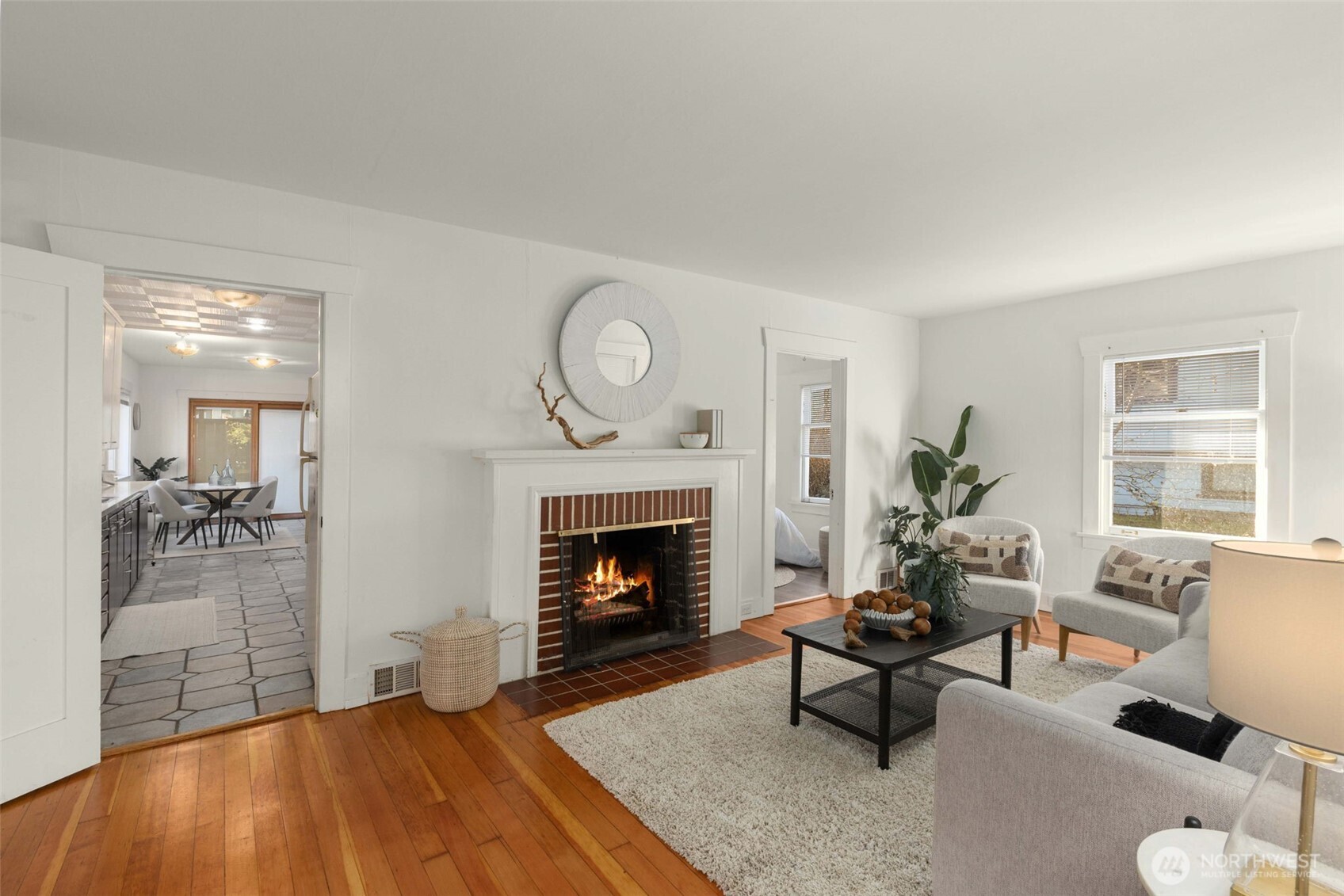 619 Northwest 89th Street Seattle, WA 98117 - Photo 3 of 24 a living room with furniture and a fireplace