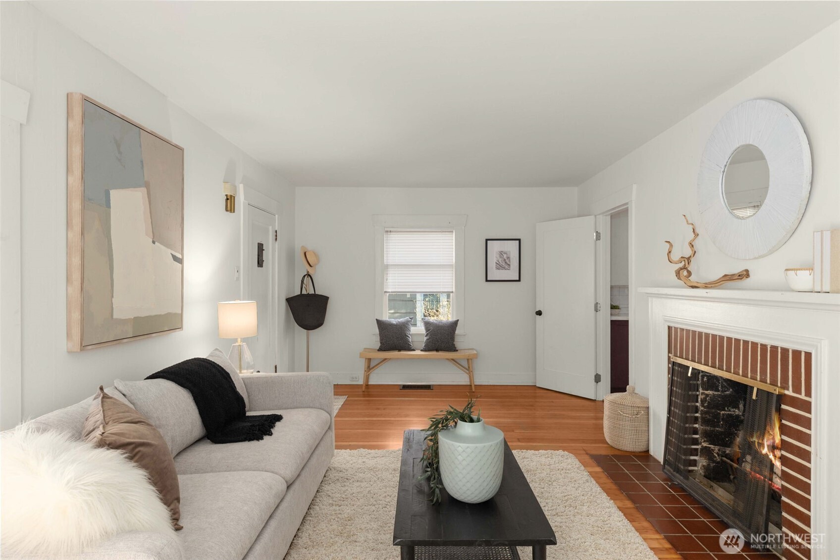 619 Northwest 89th Street Seattle, WA 98117 - Photo 5 of 24 a living room with furniture and a fireplace