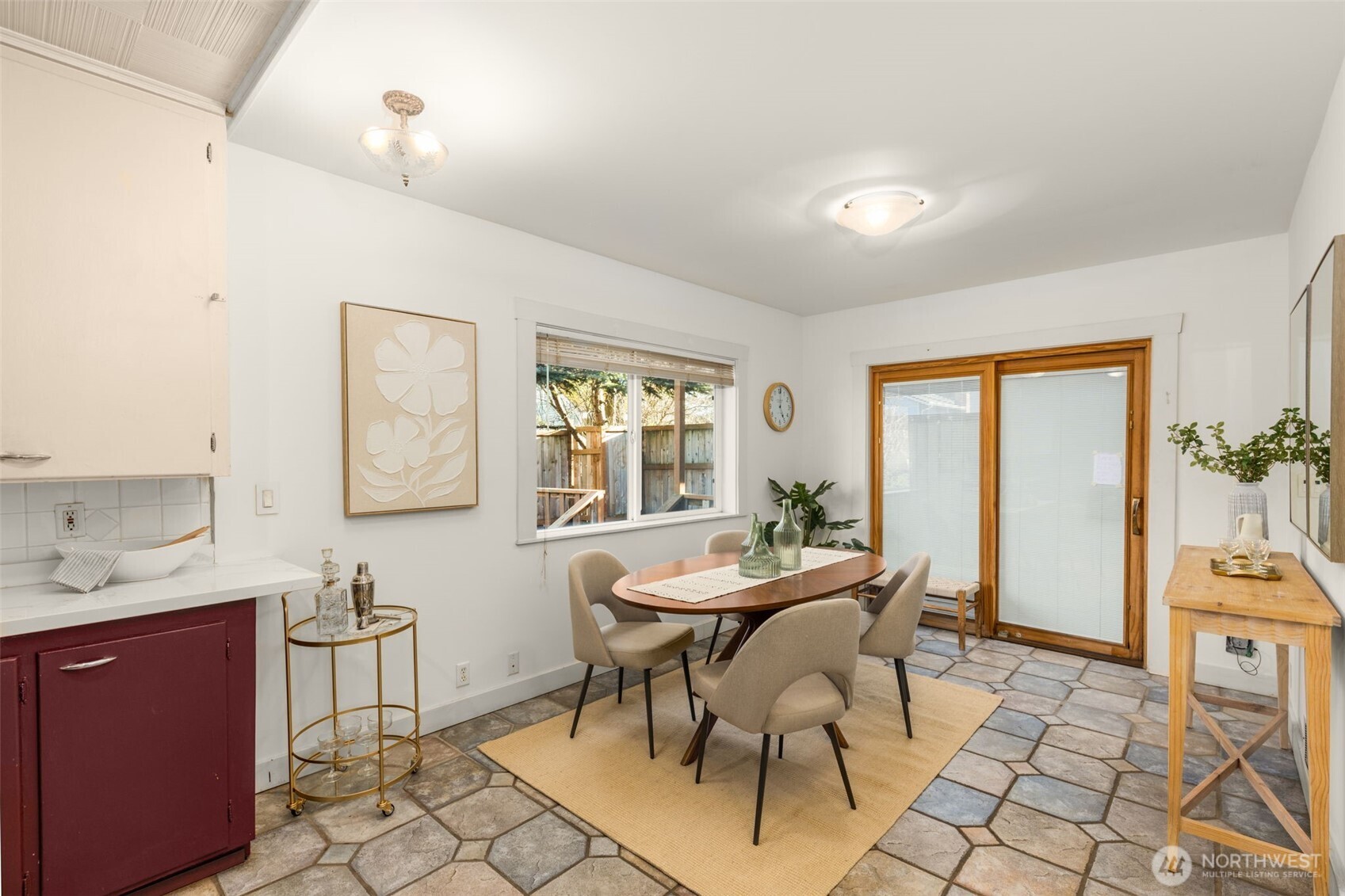 619 Northwest 89th Street Seattle, WA 98117 - Photo 10 of 24 a dining room with furniture and window