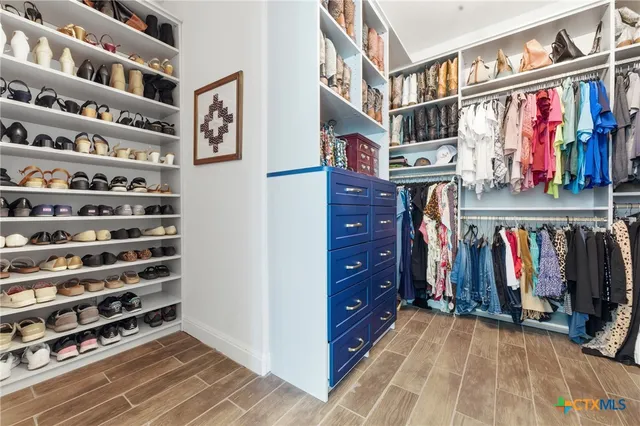 a bathroom with a sink double vanity and a shower