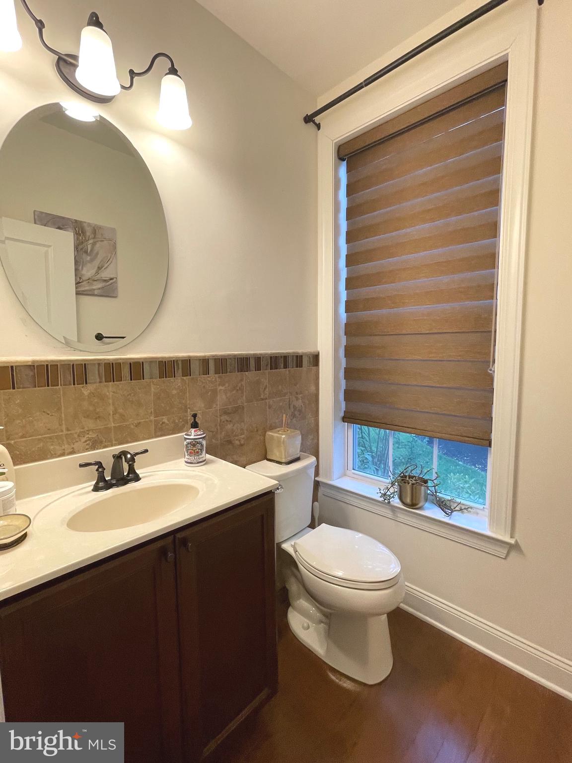 17 Peacock Way Princeton, NJ 08540 - Photo 17 of 44 a bathroom with a sink a toilet and mirror