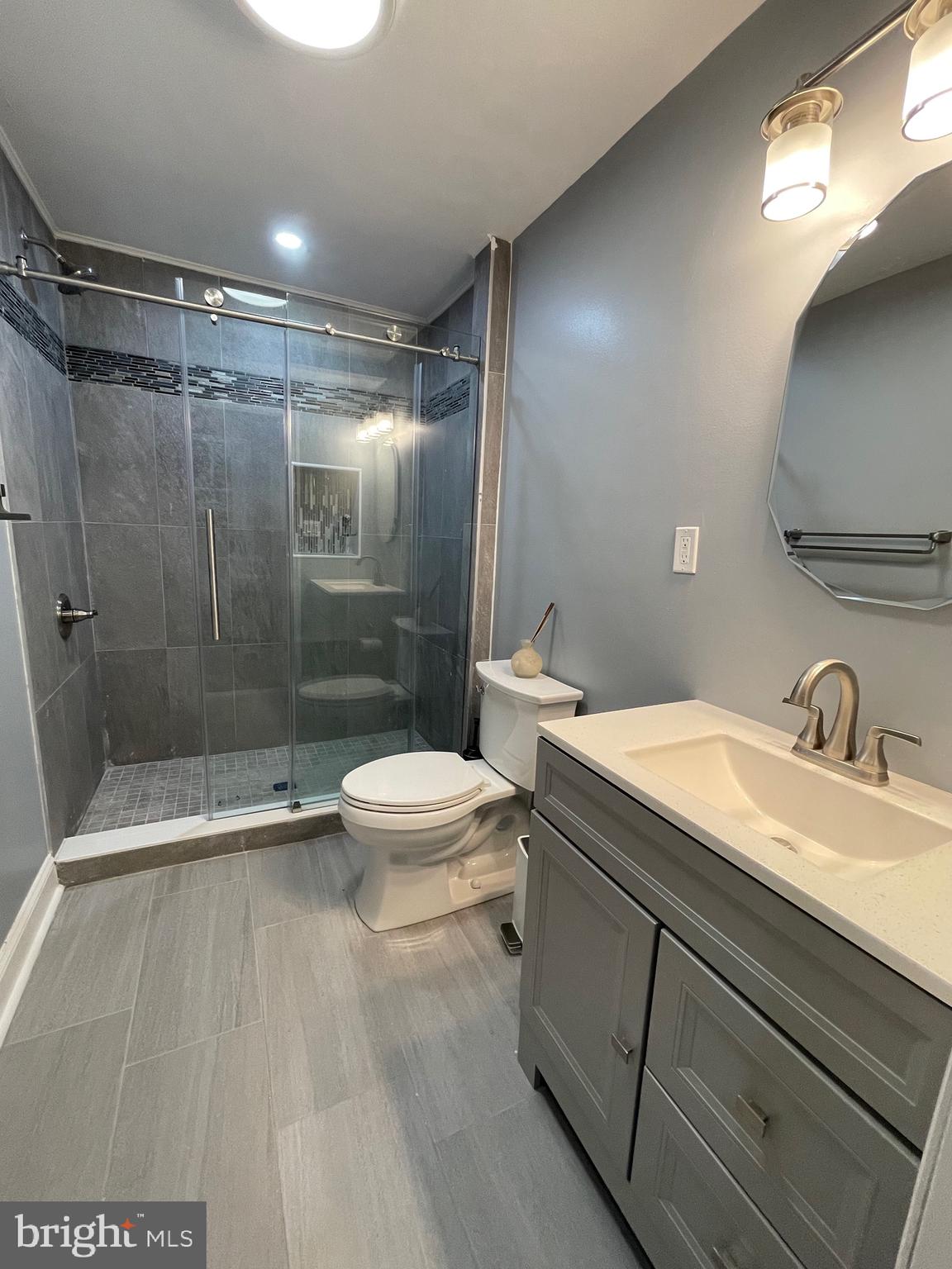17 Peacock Way Princeton, NJ 08540 - Photo 39 of 44 a bathroom with a sink a toilet and shower