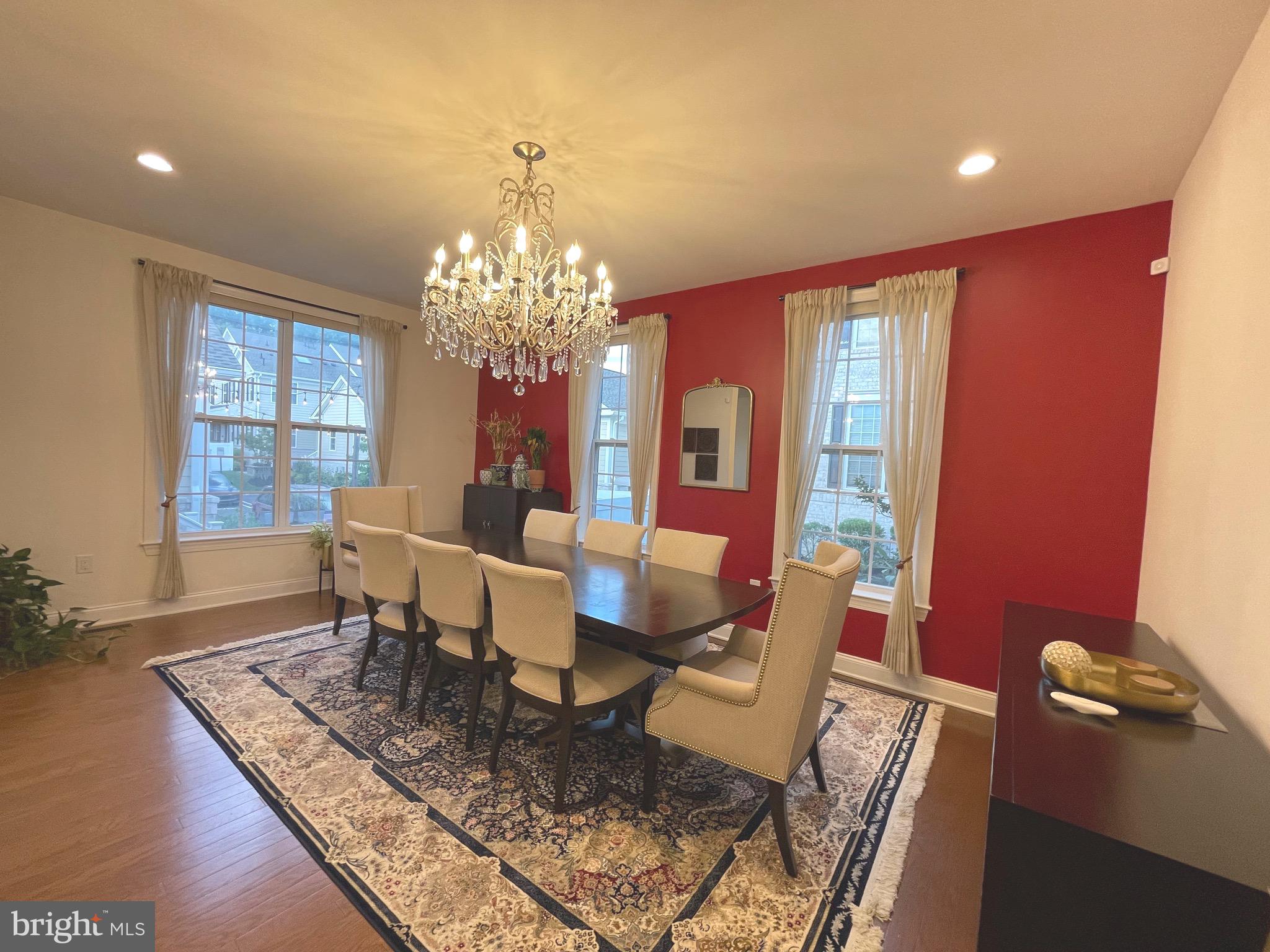 17 Peacock Way Princeton, NJ 08540 - Photo 8 of 44 a dining room with furniture a rug and a chandelier