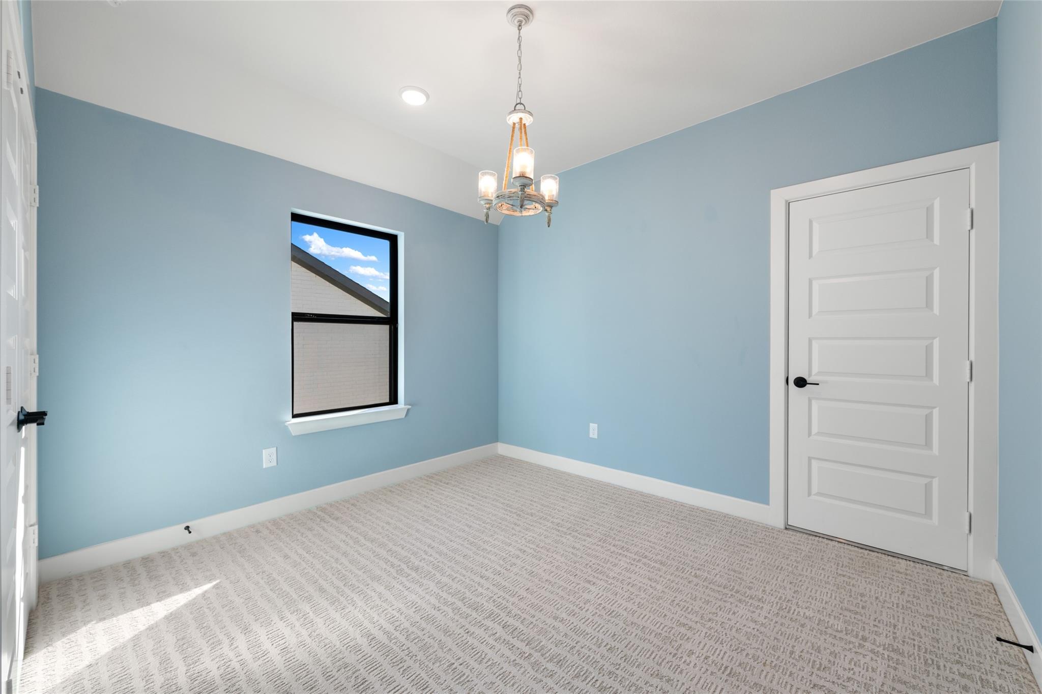 6216 Bower Well Road Austin, TX 78738 - Photo 25 of 31 wooden floor in an empty room with a window