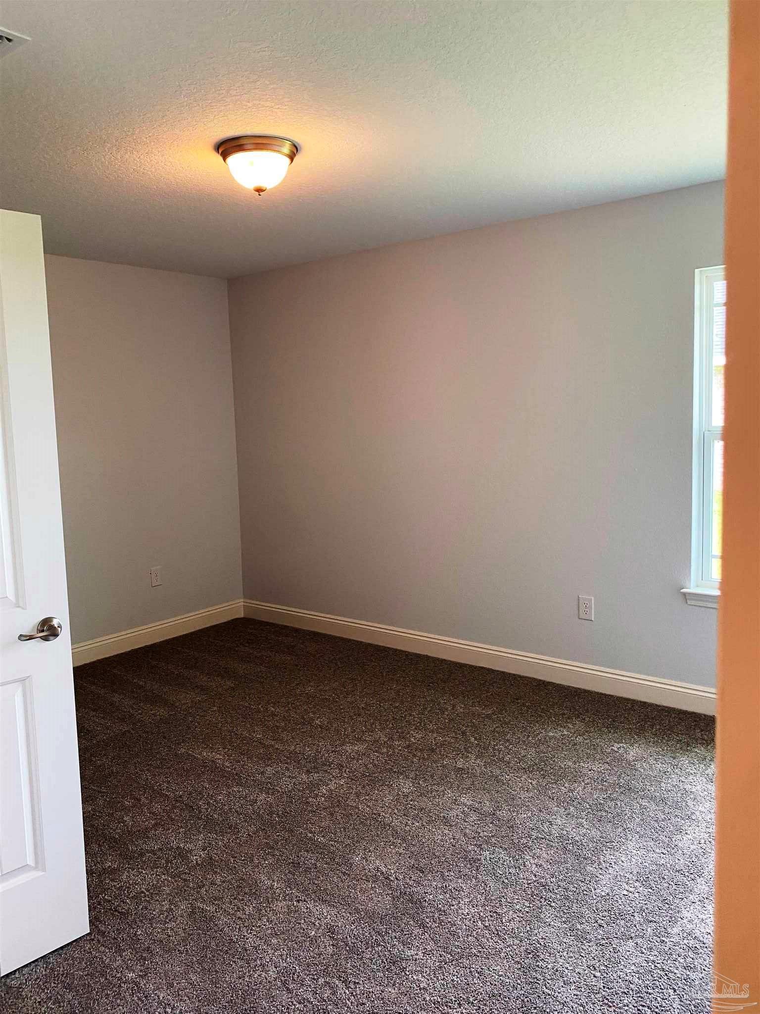 5266 South A Jones Road Milton, FL 32583 - Photo 20 of 34 Here's a view of the 3rd bedroom.