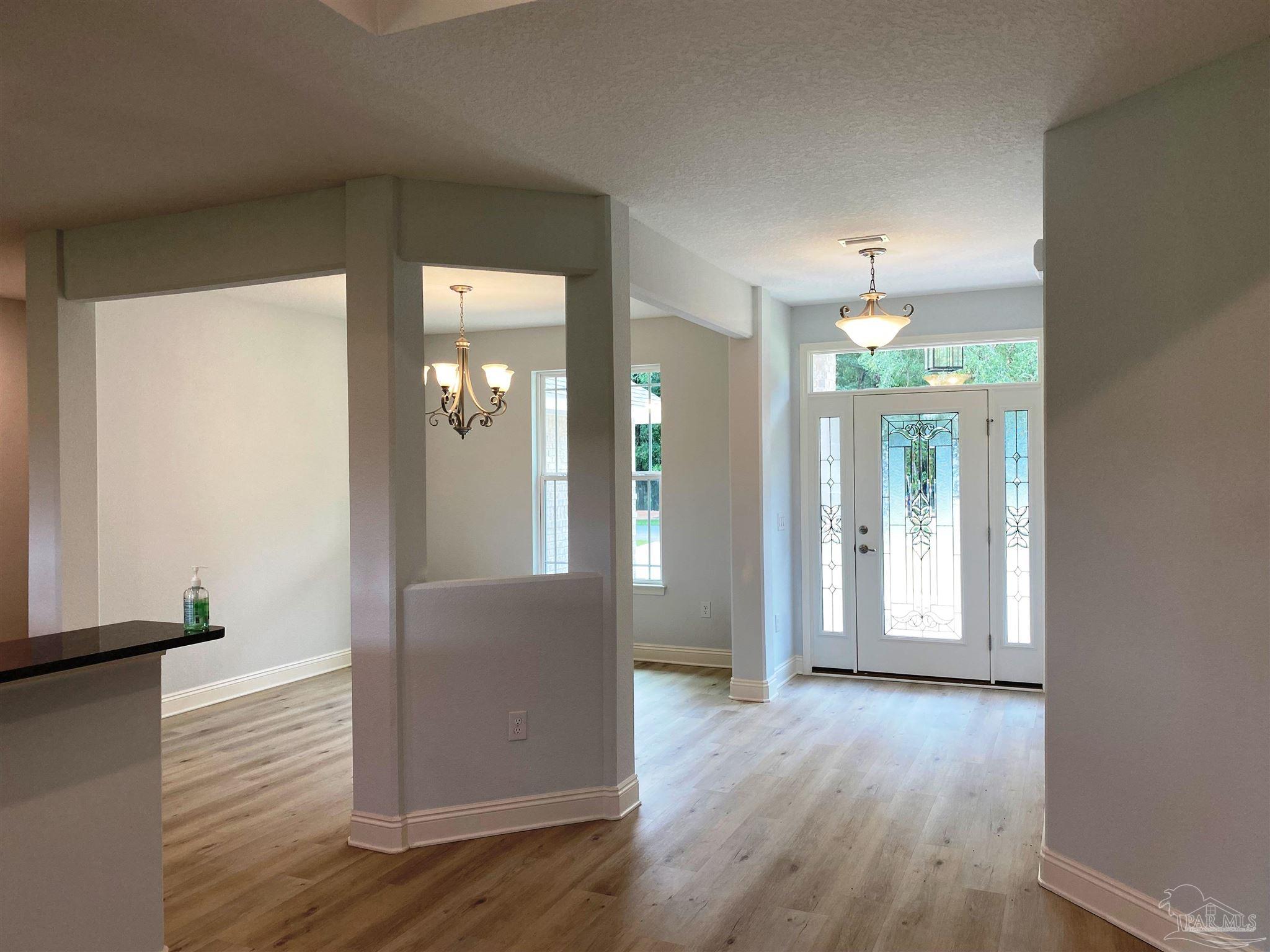 5266 South A Jones Road Milton, FL 32583 - Photo 23 of 34 Impressive foyer leads to the home interior.