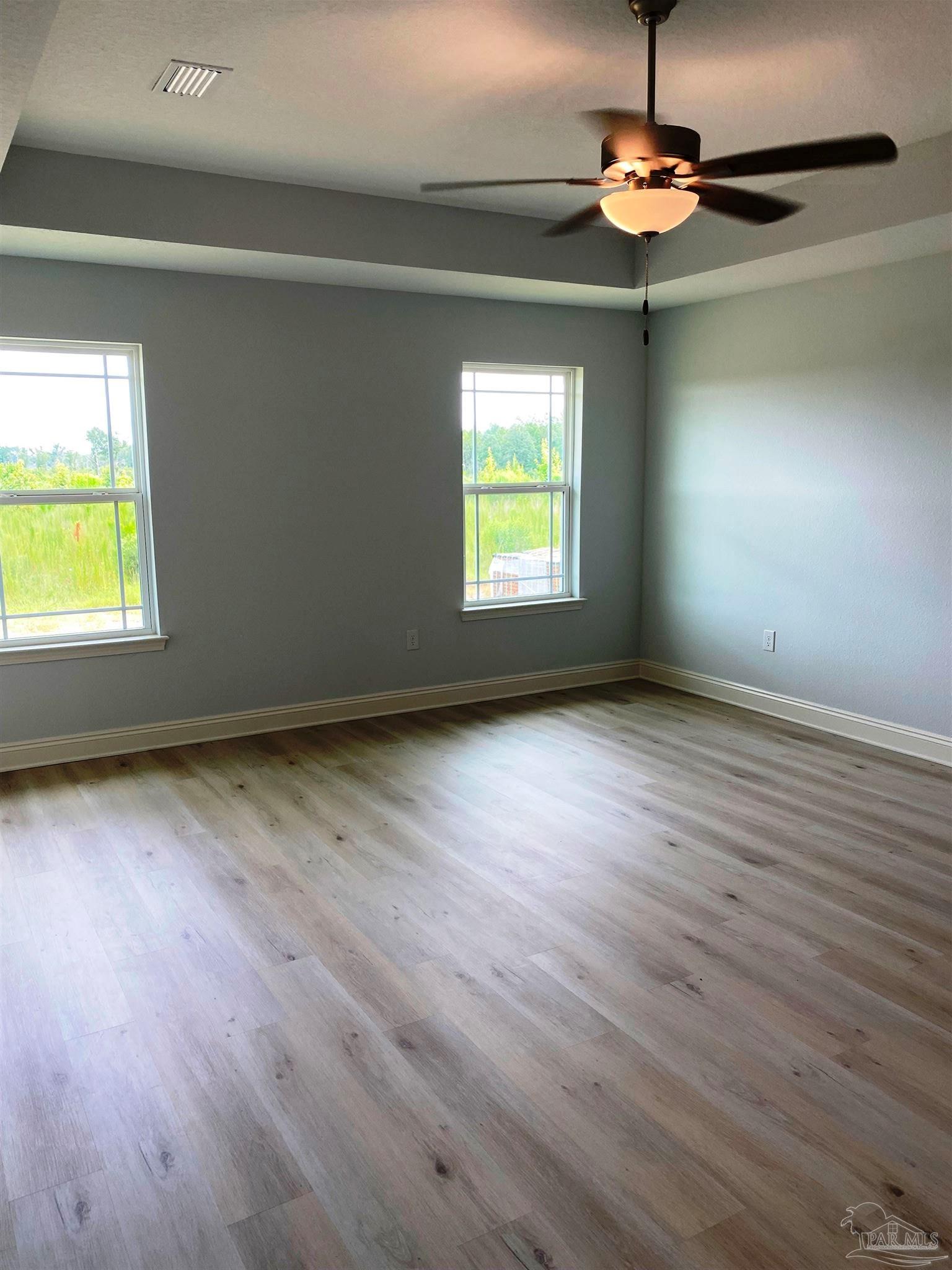 5266 South A Jones Road Milton, FL 32583 - Photo 24 of 34 Master bedroom has box ceiling w/fan/light.