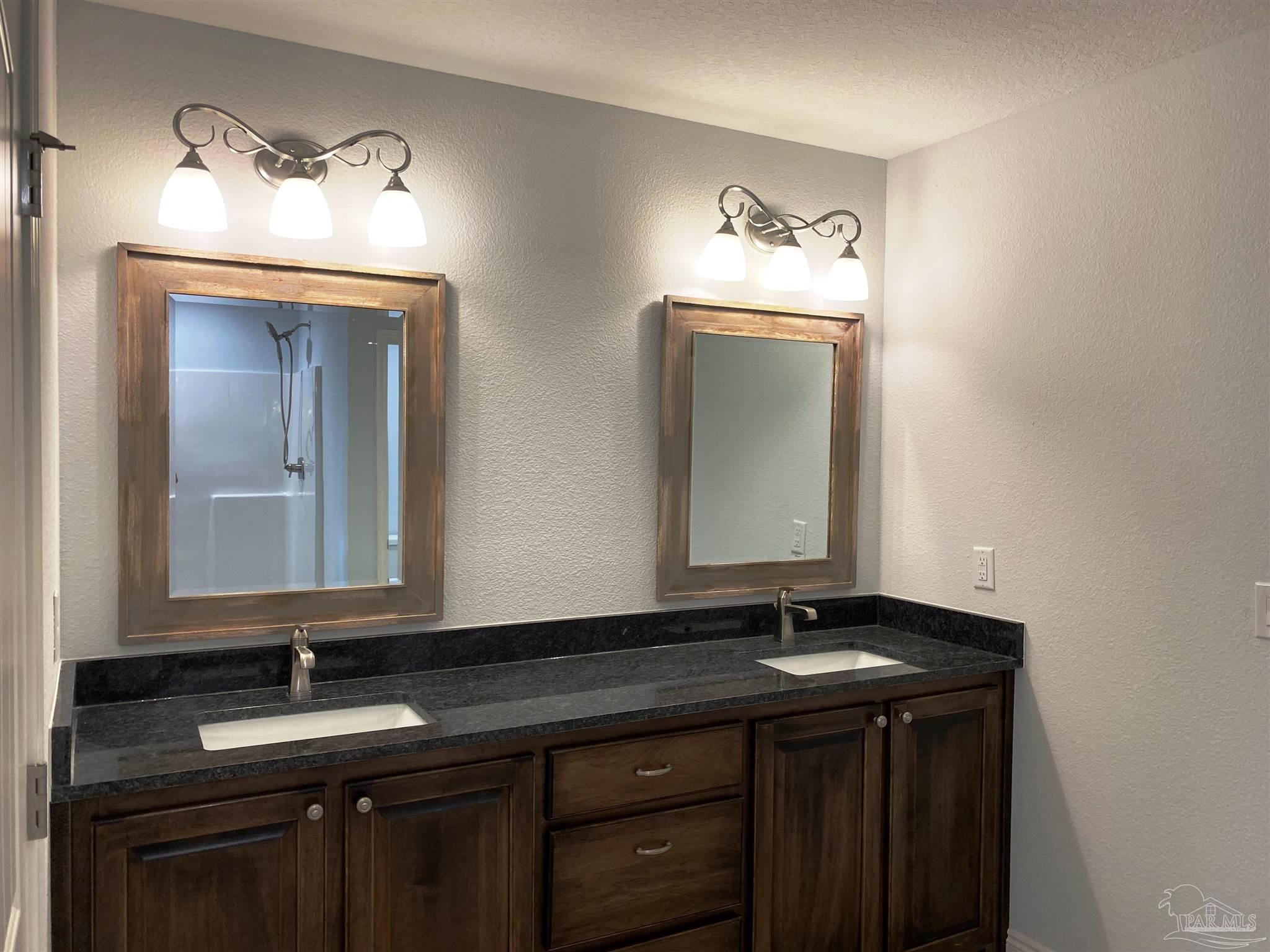 5266 South A Jones Road Milton, FL 32583 - Photo 27 of 34 Master bath has a dual sink vanity top.