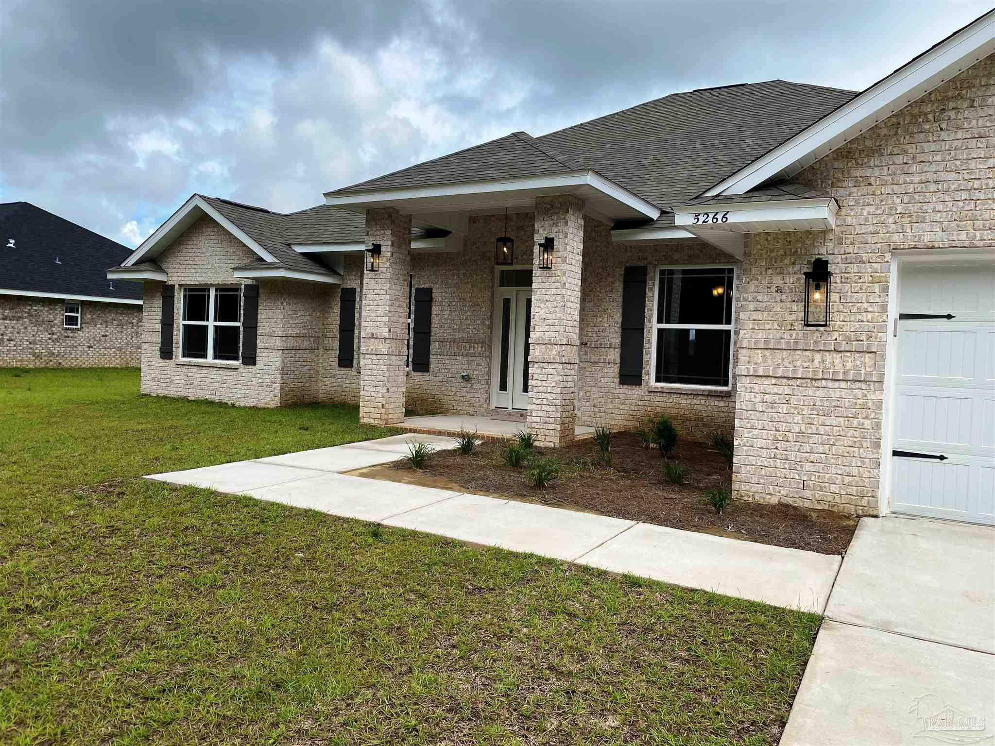 5266 South A Jones Road Milton, FL 32583 - Photo 30 of 34 Covered front porch welcomes one and all.