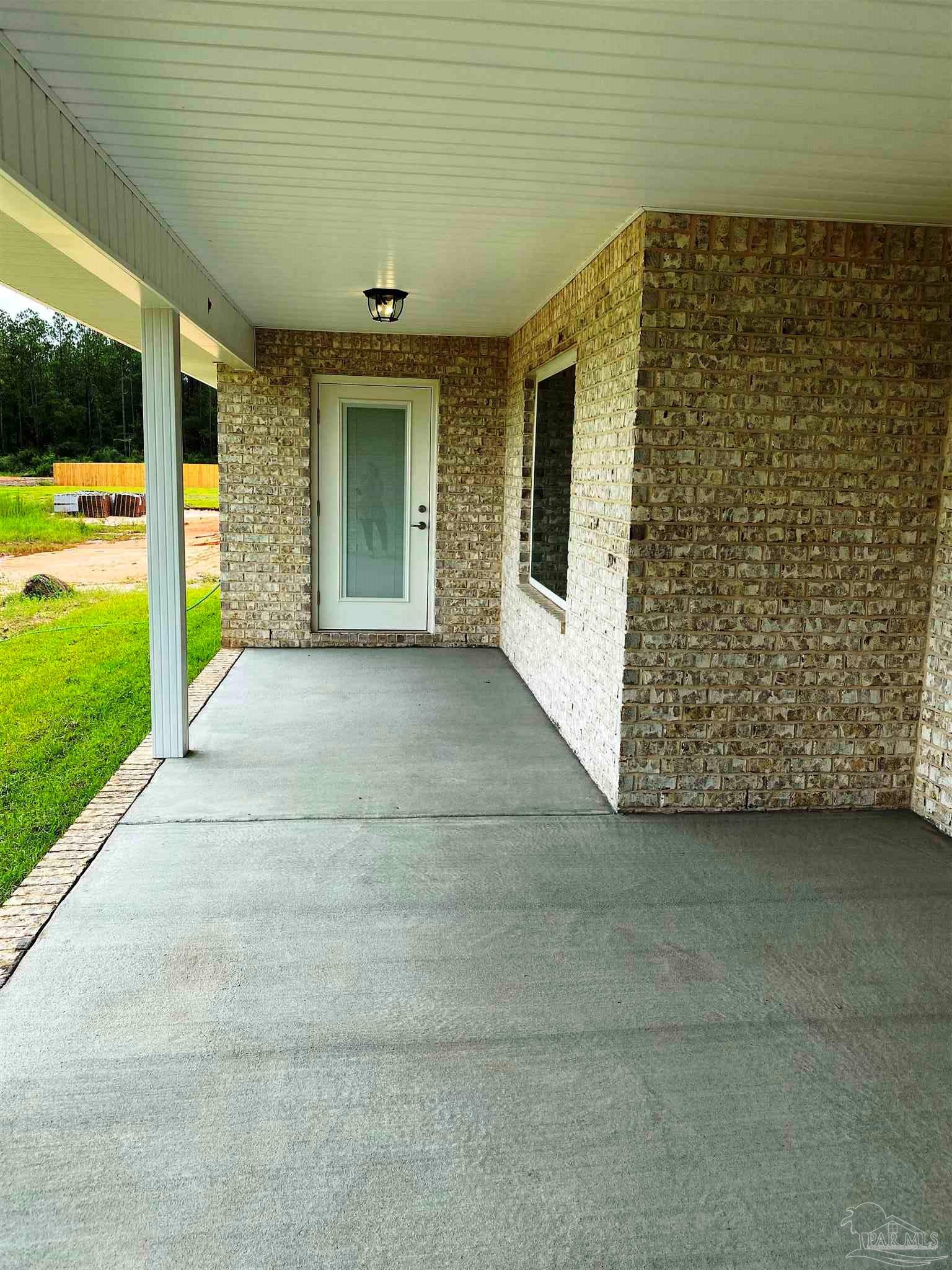 5266 South A Jones Road Milton, FL 32583 - Photo 32 of 34 Unwind & relax on the giant covered patio.