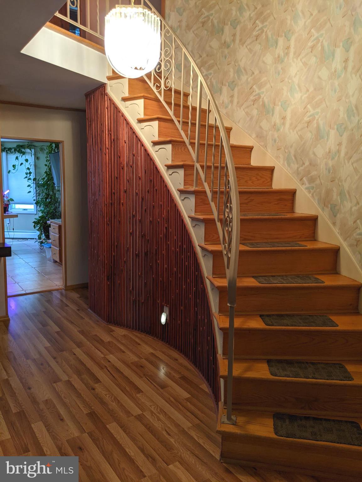 1154 Mettler Road Huntingdon Valley, PA 19006 - Photo 2 of 17 Curved Stairway