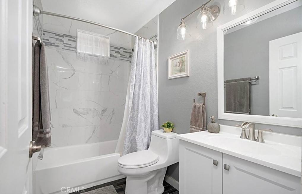 14903 Manor Court Chino Hills, CA 91709 - Photo 7 of 15 a bathroom with a sink toilet and shower