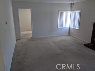 49438 Conejo Road Morongo Valley, CA 92256 - Photo 11 of 18 an empty room with windows